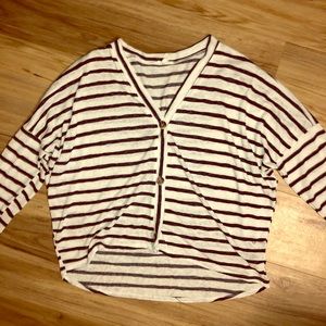 Maurice’s navy and white cardigan